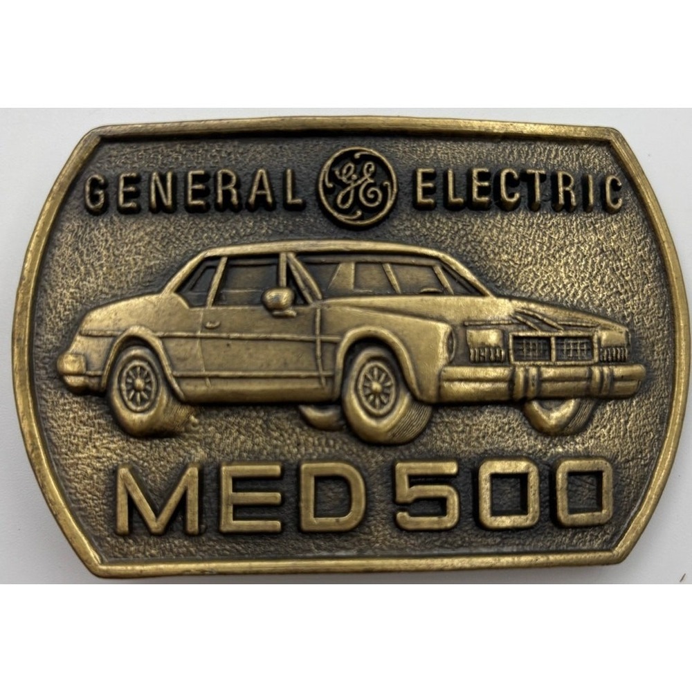 Vintage 79 General Electric MED 500 Brass Belt Buckle Safety Award GE Car Design